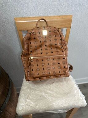 MCM Backpack with Gold Logo Accents